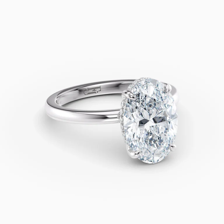 Oval Diamond Set In 18 Karat White Gold Engagement Ring Front Side View