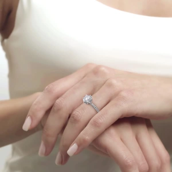 Woman's hand with custom engagement ring scottsdale