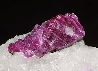 uncut ruby in calcite